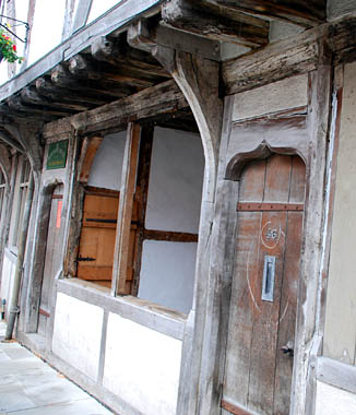 Medieval shop-front in Tewkesbury; photo &copy; S. Alsford